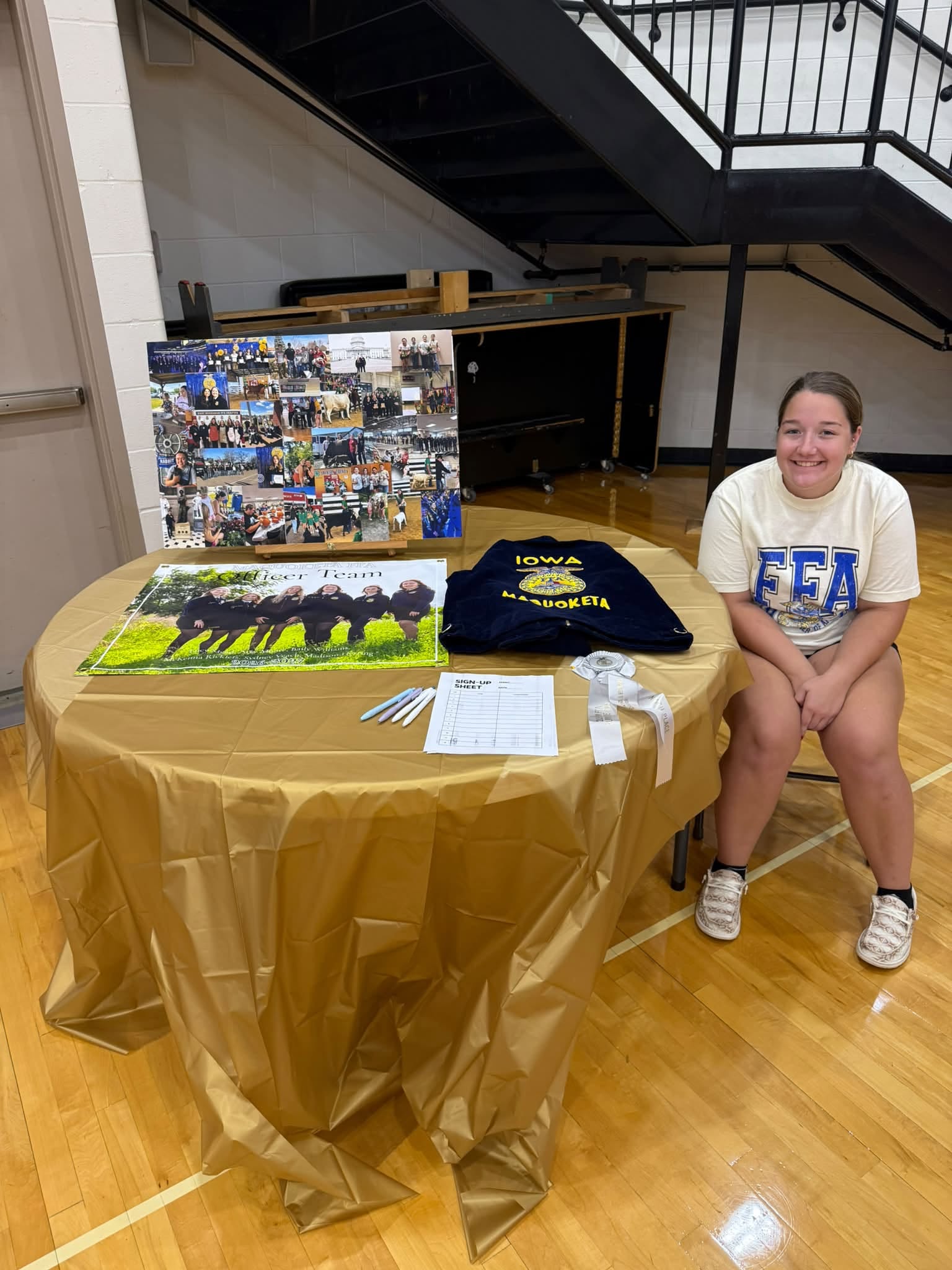 A member sitting at the FFA table at Freshman Orientation.