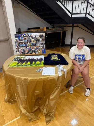 A member sitting at the FFA table at Freshman Orientation.