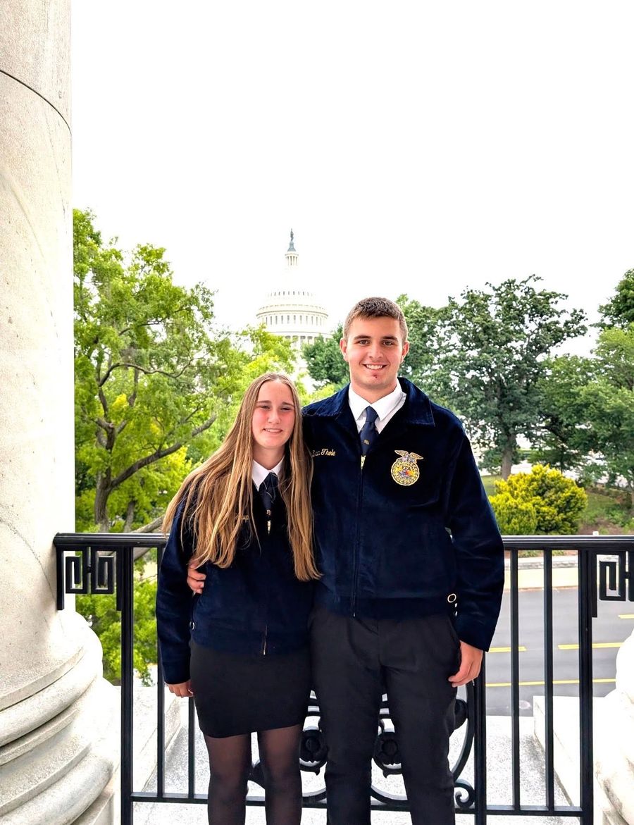 Two members in FFA official dress at the U.S. Capitol.